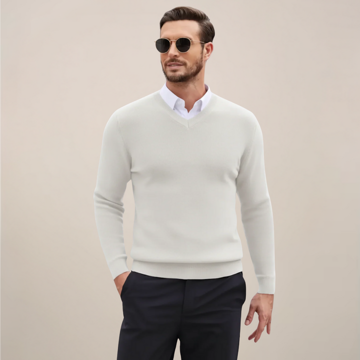 Comfortable men's V-neck knit pullover, a classic addition to any fall and winter wardrobe. Men's apparel.