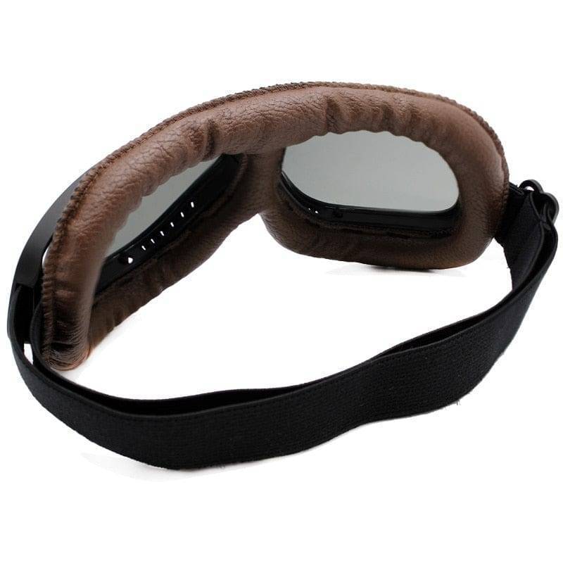 Close-up of classic pilot biker goggles, showcasing design for vintage appeal and protection