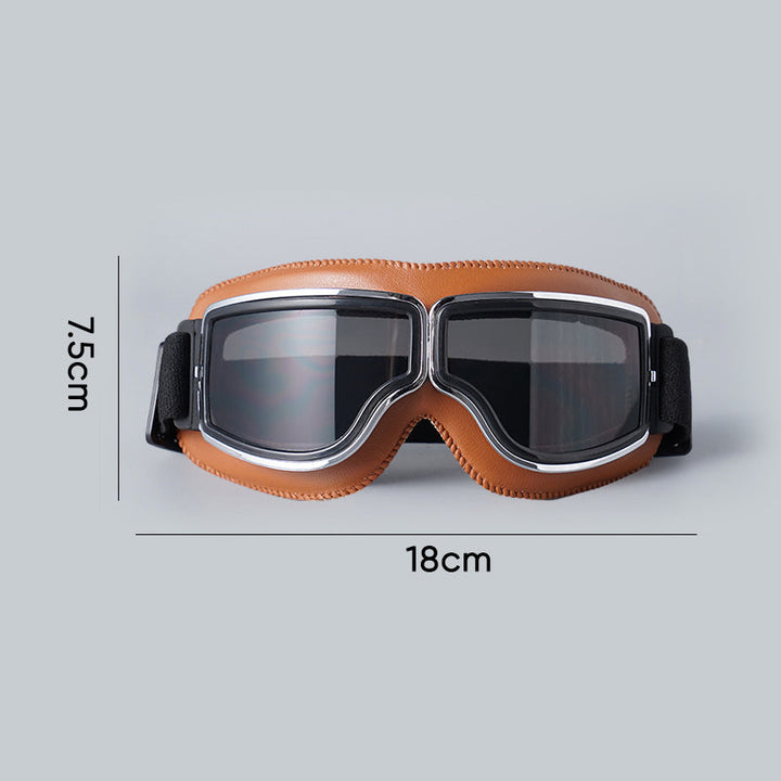 Vintage brown motorcycle goggles, windproof eye protection for riders.