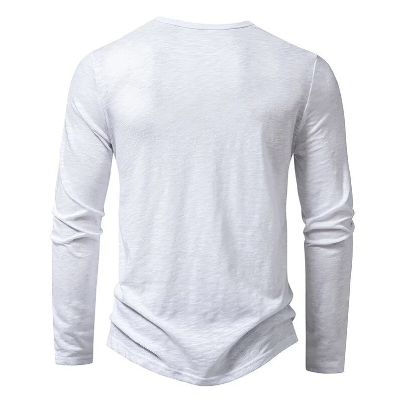 Man walking confidently in a comfortable slim fit long sleeve henley, ideal for daily activities.