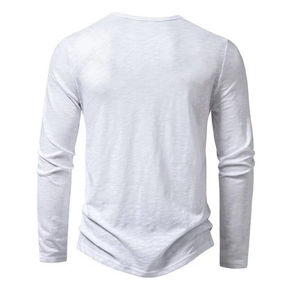 Man walking confidently in a comfortable slim fit long sleeve henley, ideal for daily activities.