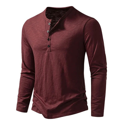 Detail of the cuff on a men's classic long sleeve henley shirt, highlighting quality and fit.