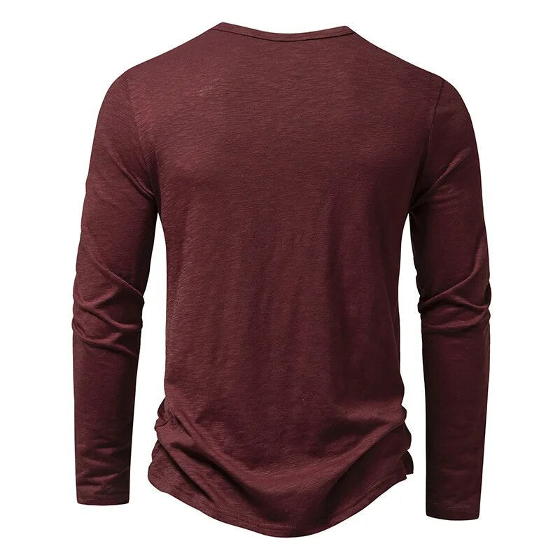 Soft knit fabric of a men's slim fit casual henley shirt, ensuring comfort and style.