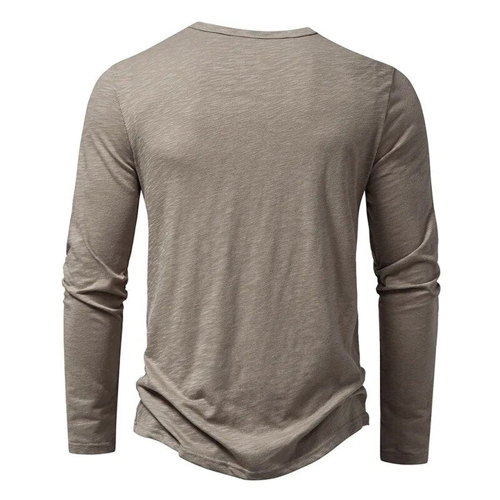 Soft cotton slim-fit henley for men, a comfortable and versatile casual shirt.
