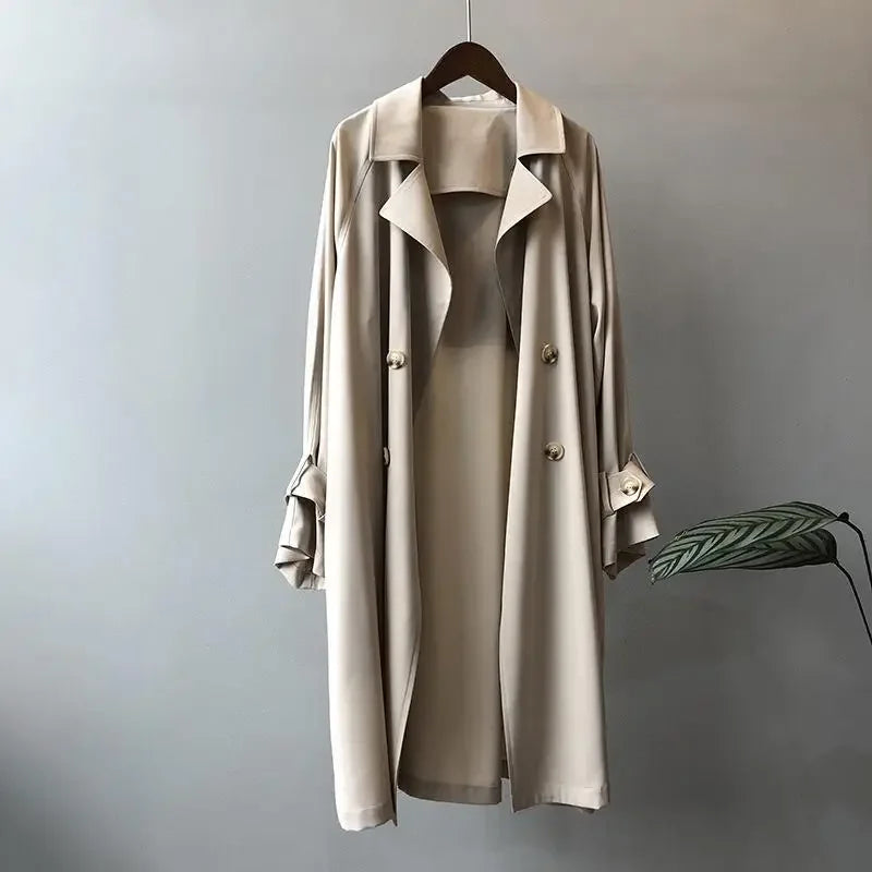 Classic women's double-breasted trench coat, timeless elegant outerwear for spring & fall fashion.