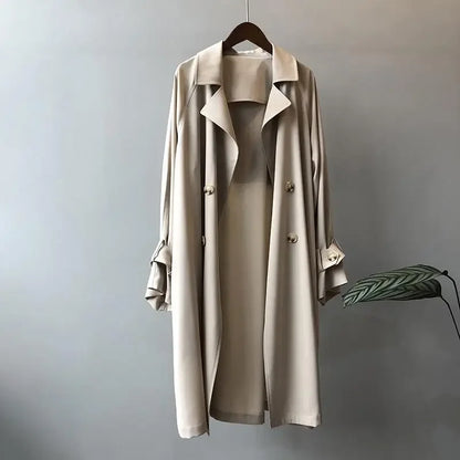 Classic women's double-breasted trench coat, timeless elegant outerwear for spring & fall fashion.