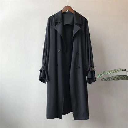Beige classic double-breasted trench coat for women, perfect versatile long jacket for spring outfits.