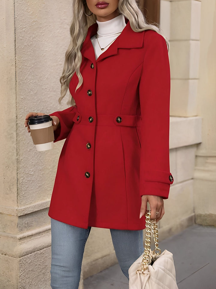 Women's longline trench coat, a sophisticated double-breasted jacket with a chic belted waist.