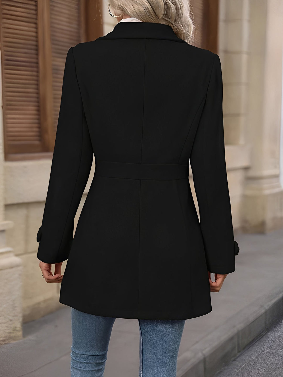 Women's fall fashion trench coat, double-breasted and belted, offering timeless sophistication.
