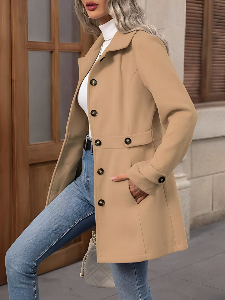 Women's classic trench coat with a chic belted waist, perfect for sophisticated fall ensembles.