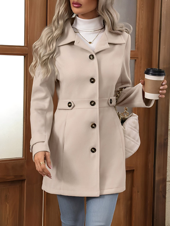 Women's workwear trench coat, a classic double-breasted style with a flattering belted waist.