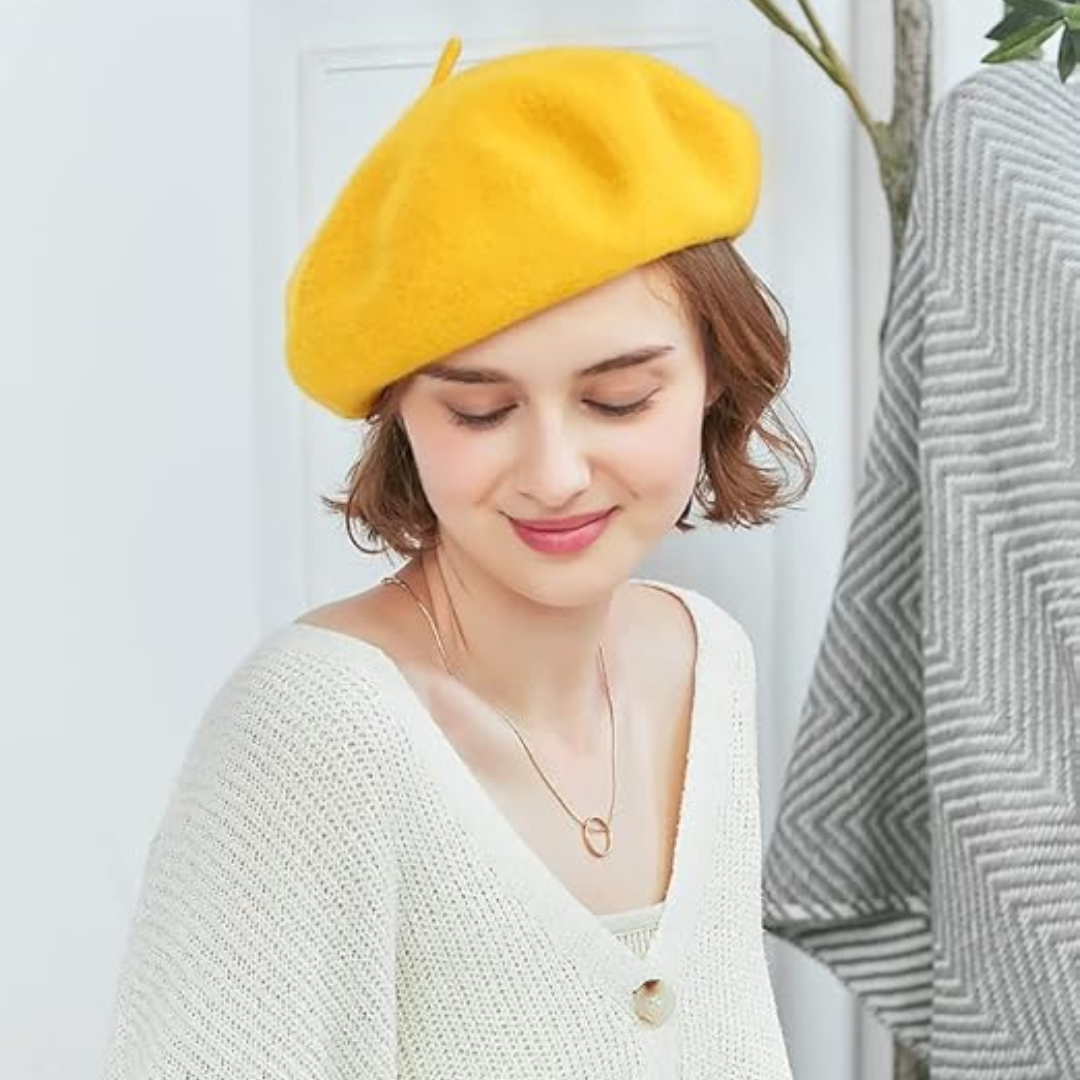 Women's stylish wool beret, a warm classic French hat for winter fashion.
