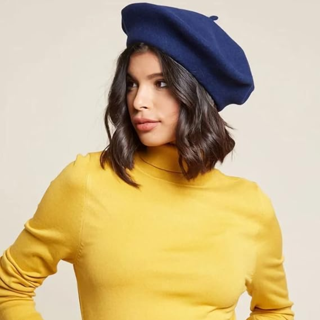 Elegant solid color women's French wool beret, classic winter accessory.