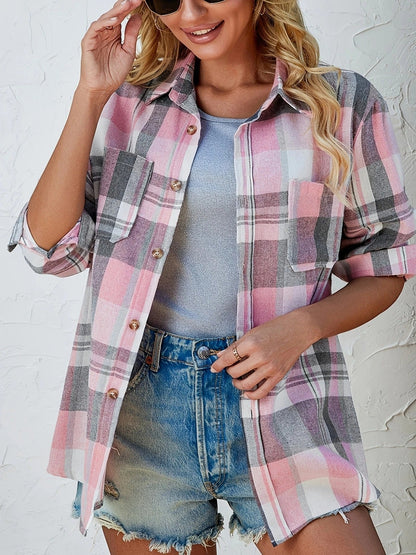 Comfortable women's blue plaid button-down shirt, versatile for stylish everyday outfits.