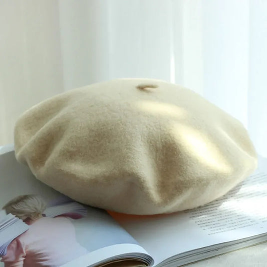 Classic women's wool beret in black. Stylish, warm headwear for winter & cold weather.