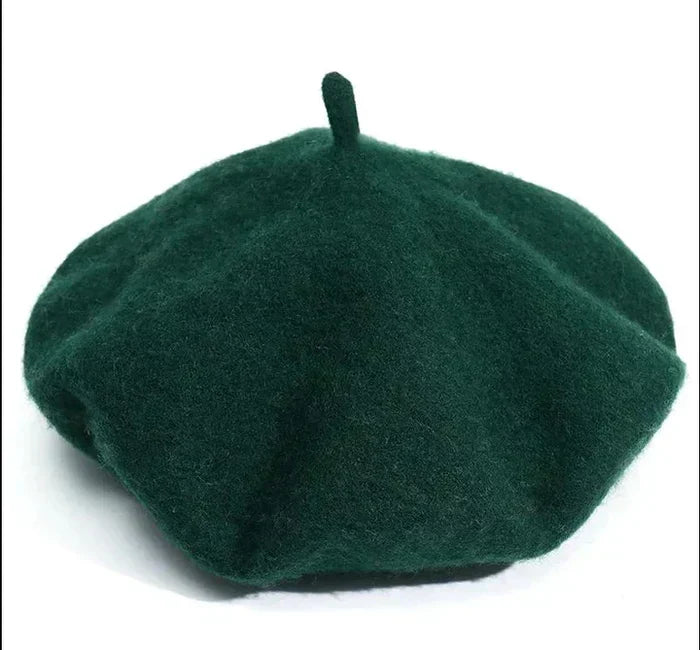 Elegant women's classic wool beret. Soft, warm ladies' hat for cold weather.