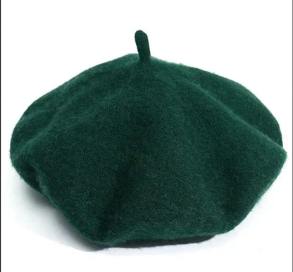 Elegant women's classic wool beret. Soft, warm ladies' hat for cold weather.