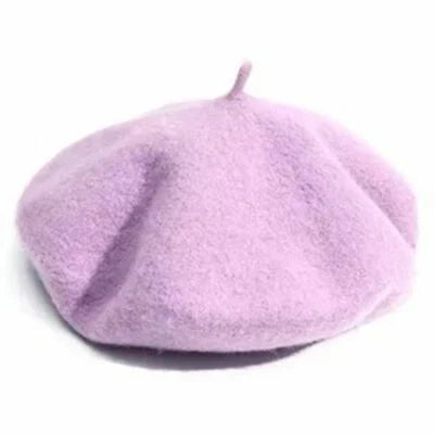 Stylish women's winter beret. Cozy wool hat, a fashionable beanie alternative.