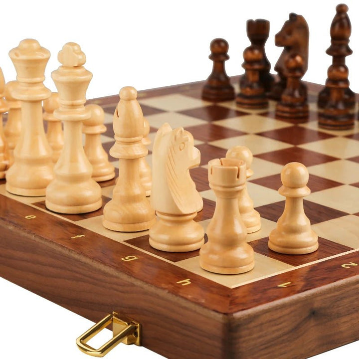 Beautiful wooden chess set with a rich walnut foldable board & traditional carved pieces.