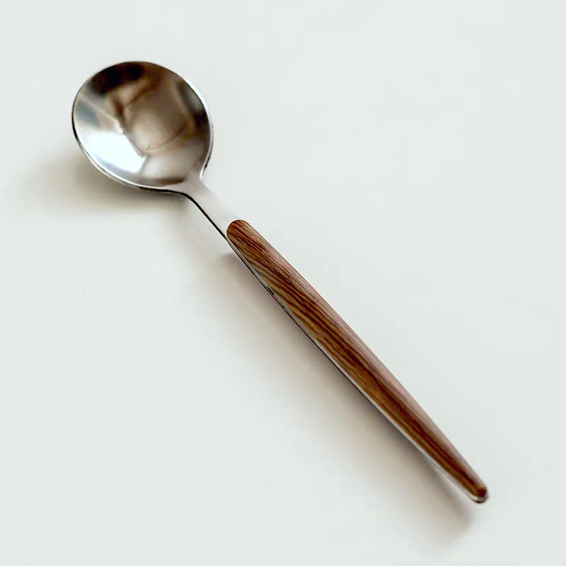 Durable borosilicate glass mug with a sturdy, ergonomic cedar wooden handle for daily use.