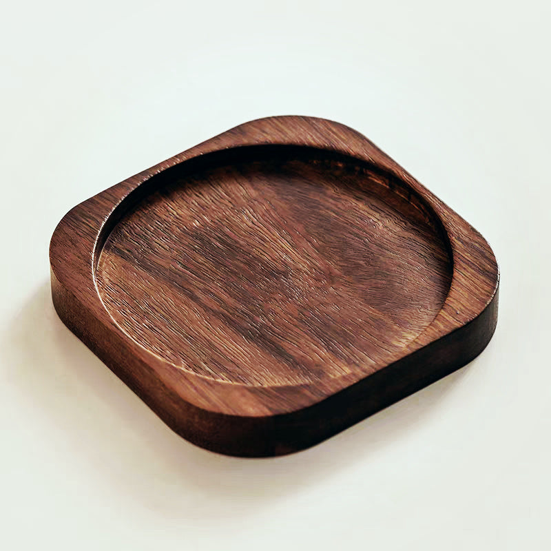 Handcrafted glass coffee or tea mug with a beautiful cedar wood handle, enhancing your home decor.