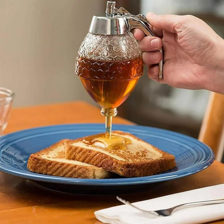 Elegant drip-free syrup server, perfect for honey, maple syrup, and sauces at the table.