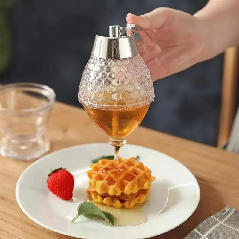 Handy kitchen accessory: clear plastic drip-free honey dispenser & sauce container.