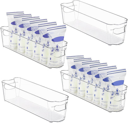 Essential home organization: 4 transparent refrigerator bins for improved food management.