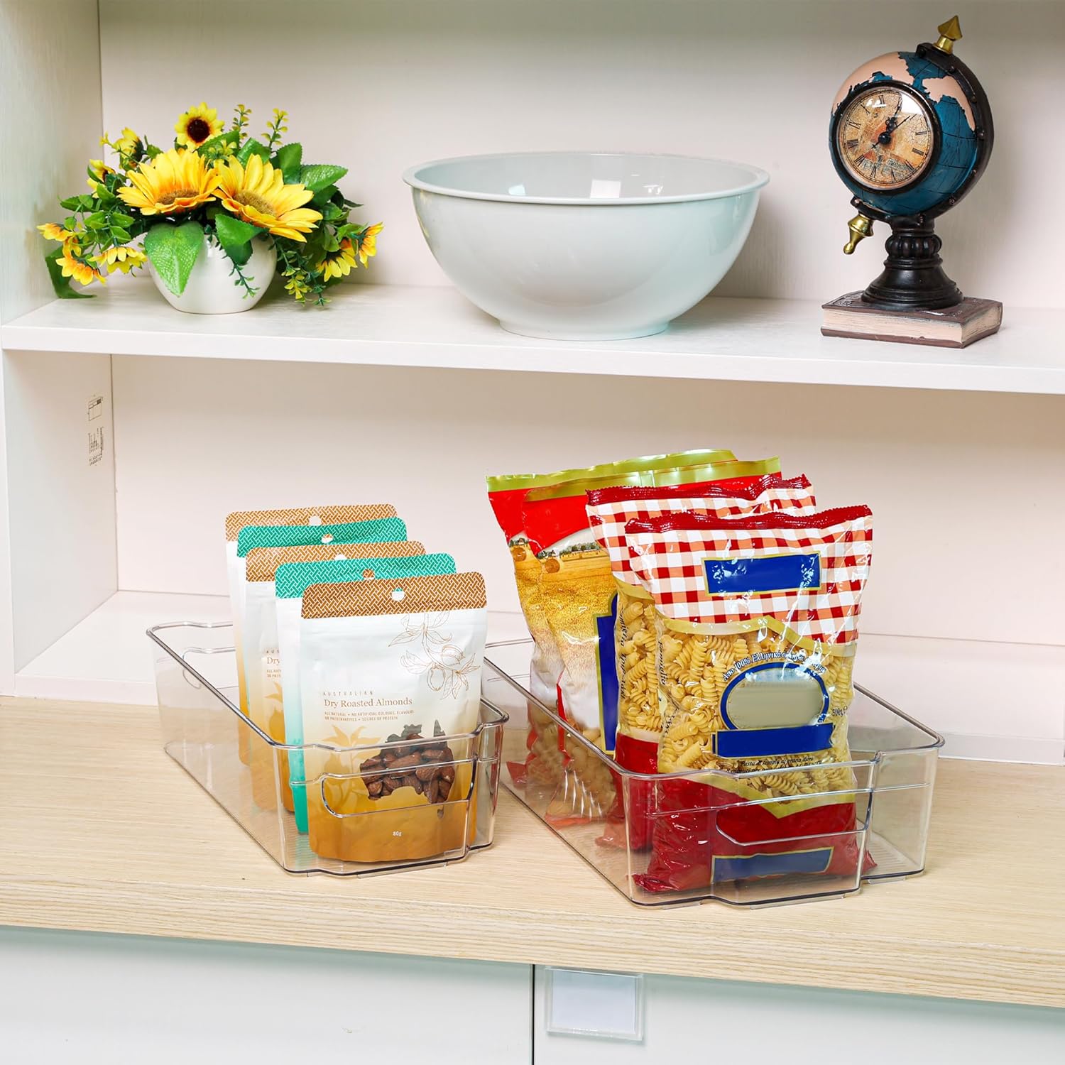 Plastic clear storage containers, a 4-piece set for efficient pantry and kitchen organization.