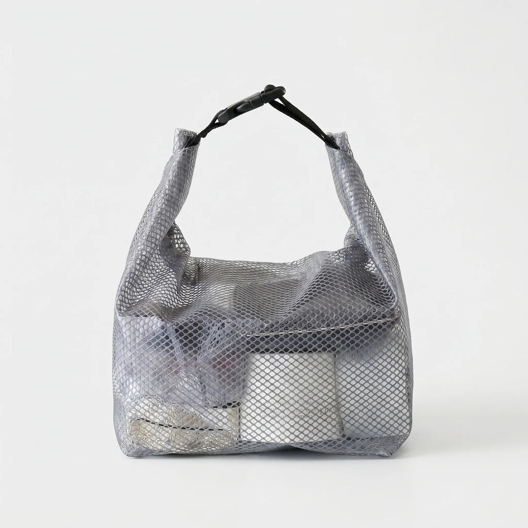 Semi-transparent waterproof cosmetic bag for gym, travel, or bathroom storage.