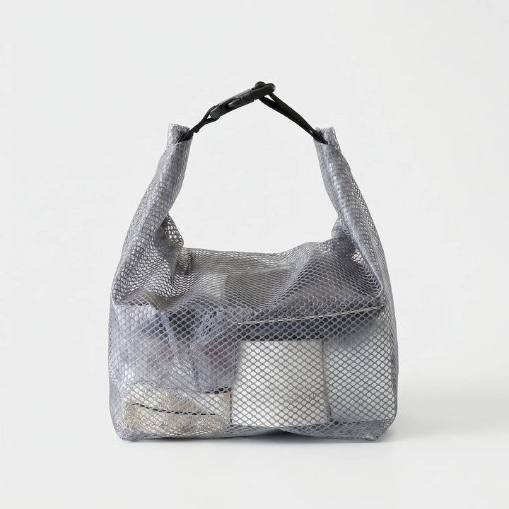 Semi-transparent waterproof cosmetic bag for gym, travel, or bathroom storage.