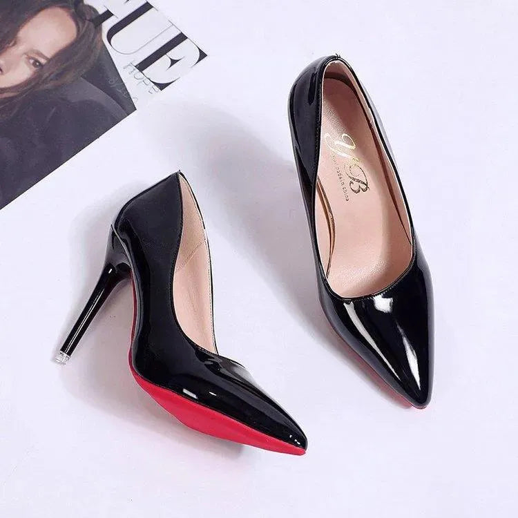 Stylish women's black stiletto heels, pointed toe pumps for classic office & party attire.