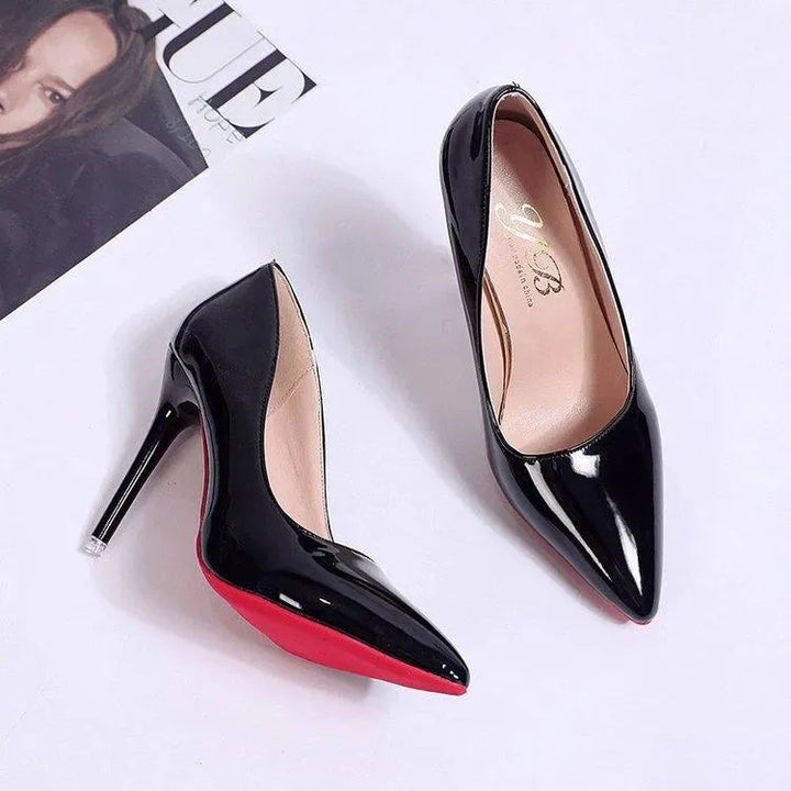 Stylish women's black stiletto heels, pointed toe pumps for classic office & party attire.
