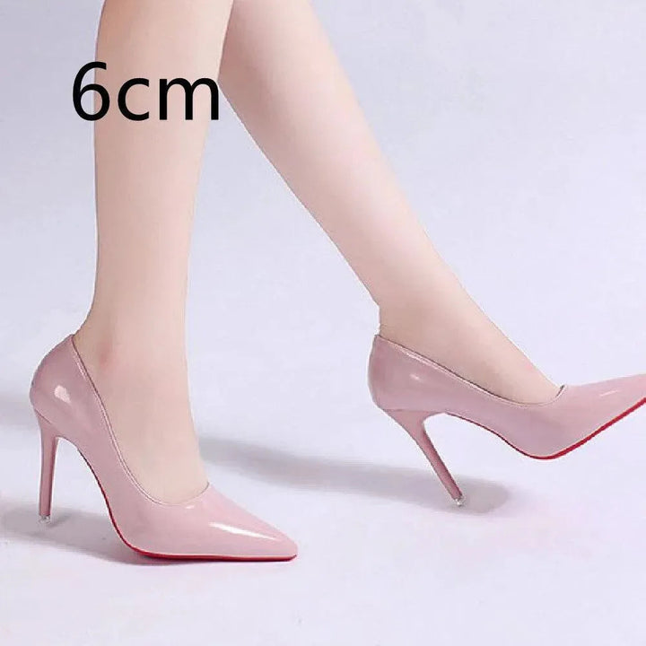 Sophisticated women's stiletto pumps in black, classic high heels for professional & party wear.