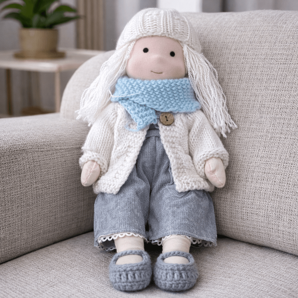 Developmental cotton Waldorf doll, handmade for children's imaginative and creative play.