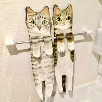 A stack of super absorbent cat lover hand towels, showcasing their cute design.