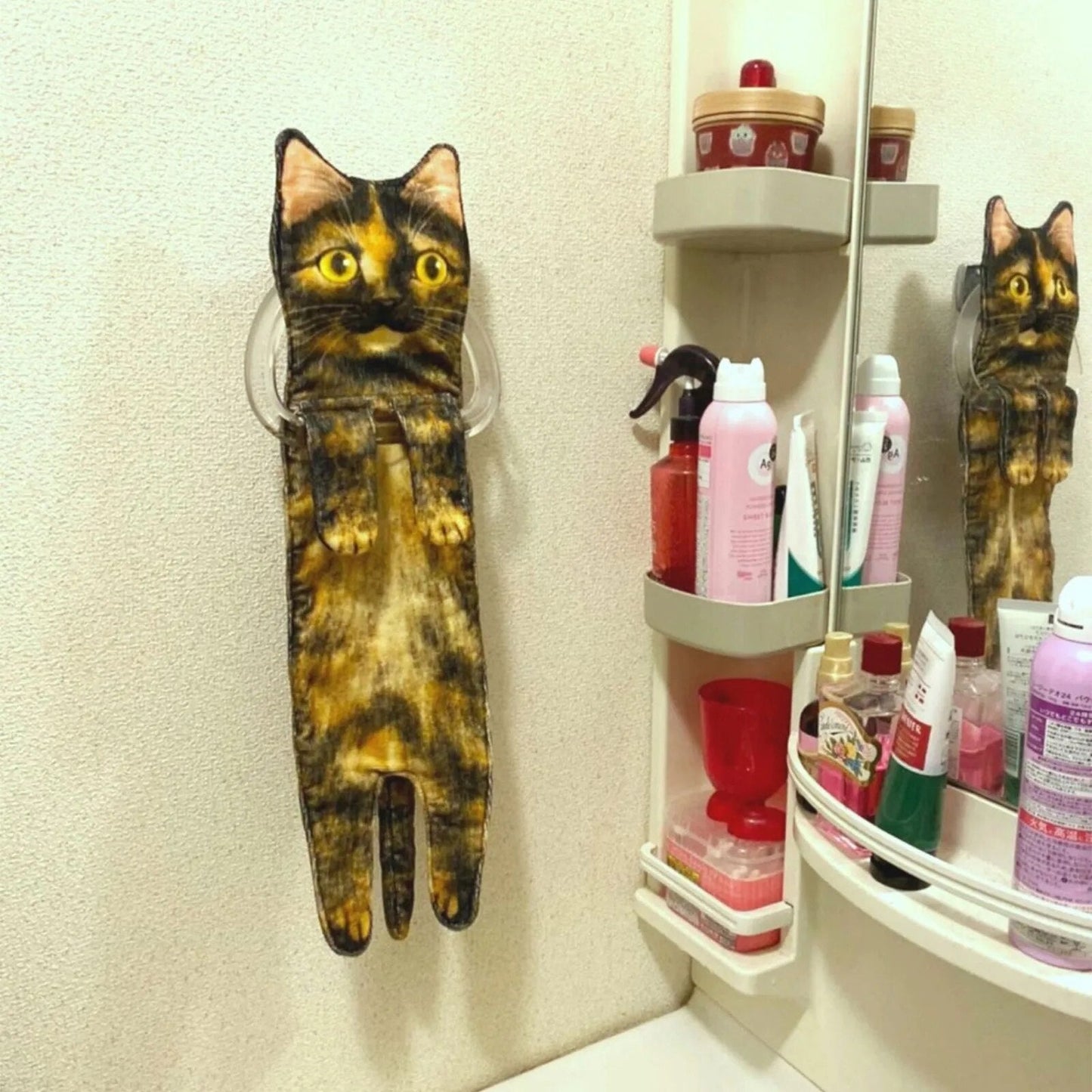 Close-up texture of the quick-dry, absorbent cat hand towel, soft to the touch.