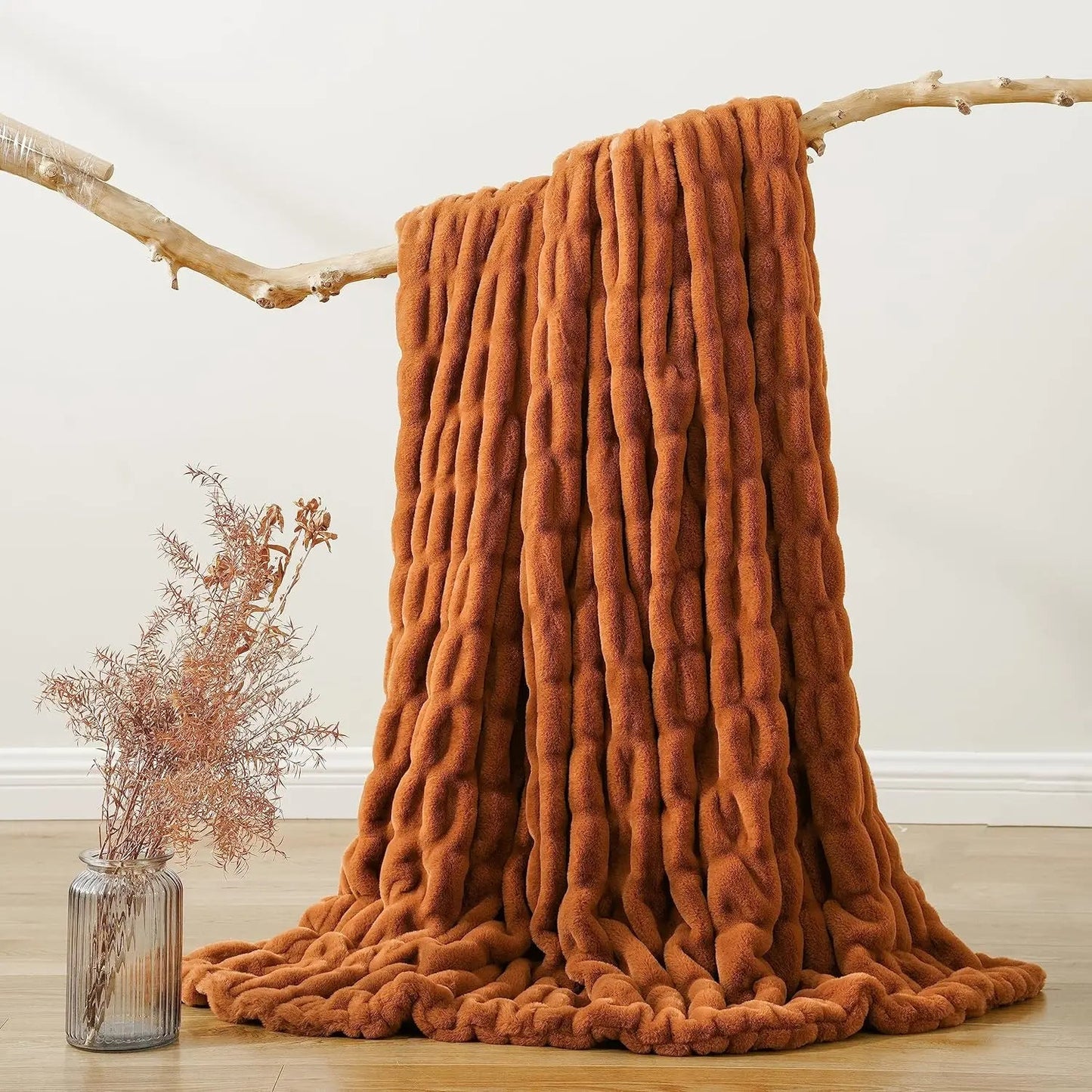 Plush & warm faux fur throw blanket, a cozy & luxurious accessory for any home decor.