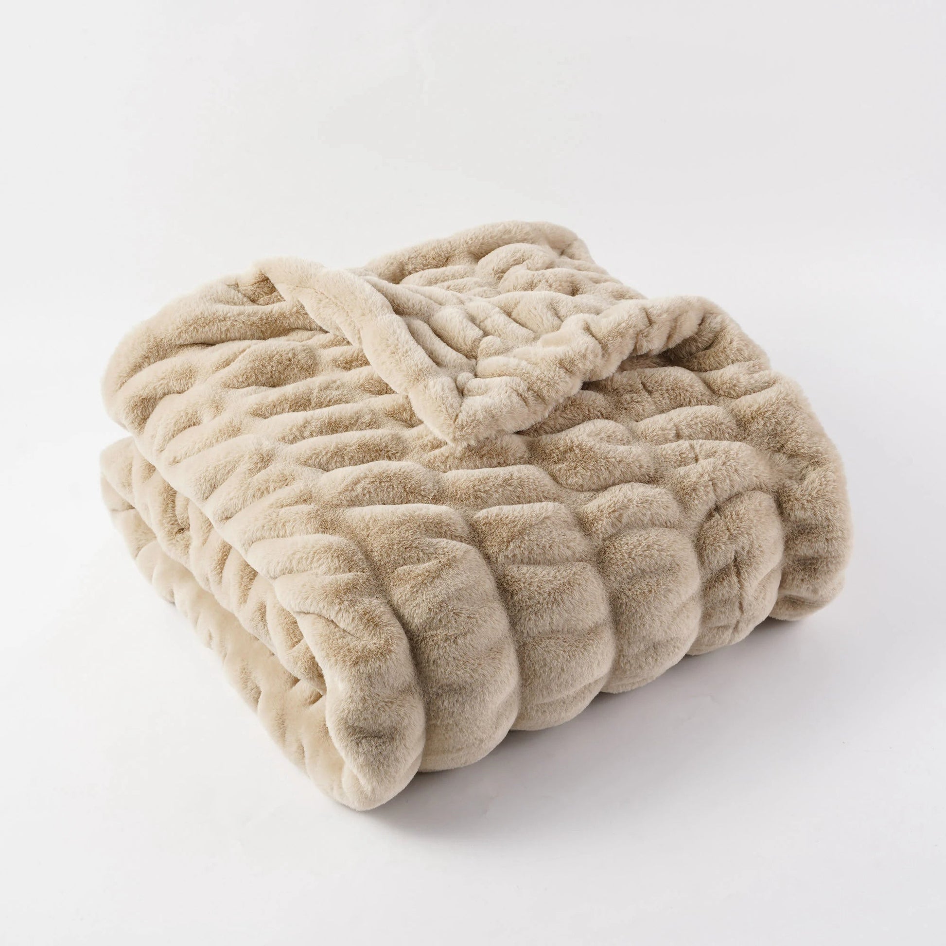 Luxurious faux rabbit fur throw, a super soft & warm blanket for ultimate home comfort & style.