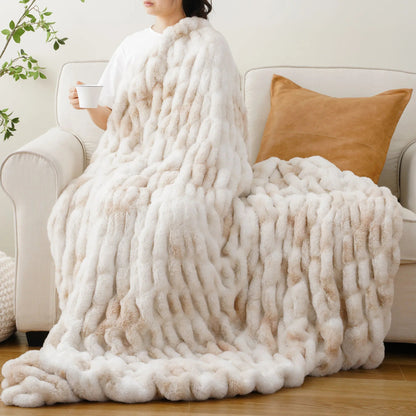 Warm & cozy faux rabbit fur throw blanket, a luxurious addition to any bedroom or living room.