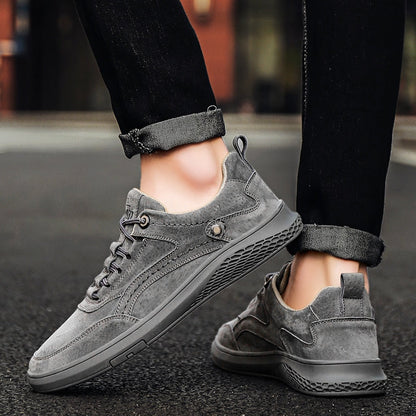 Pair of 1987-inspired men's casual sneakers, offering retro style and all-day comfort.