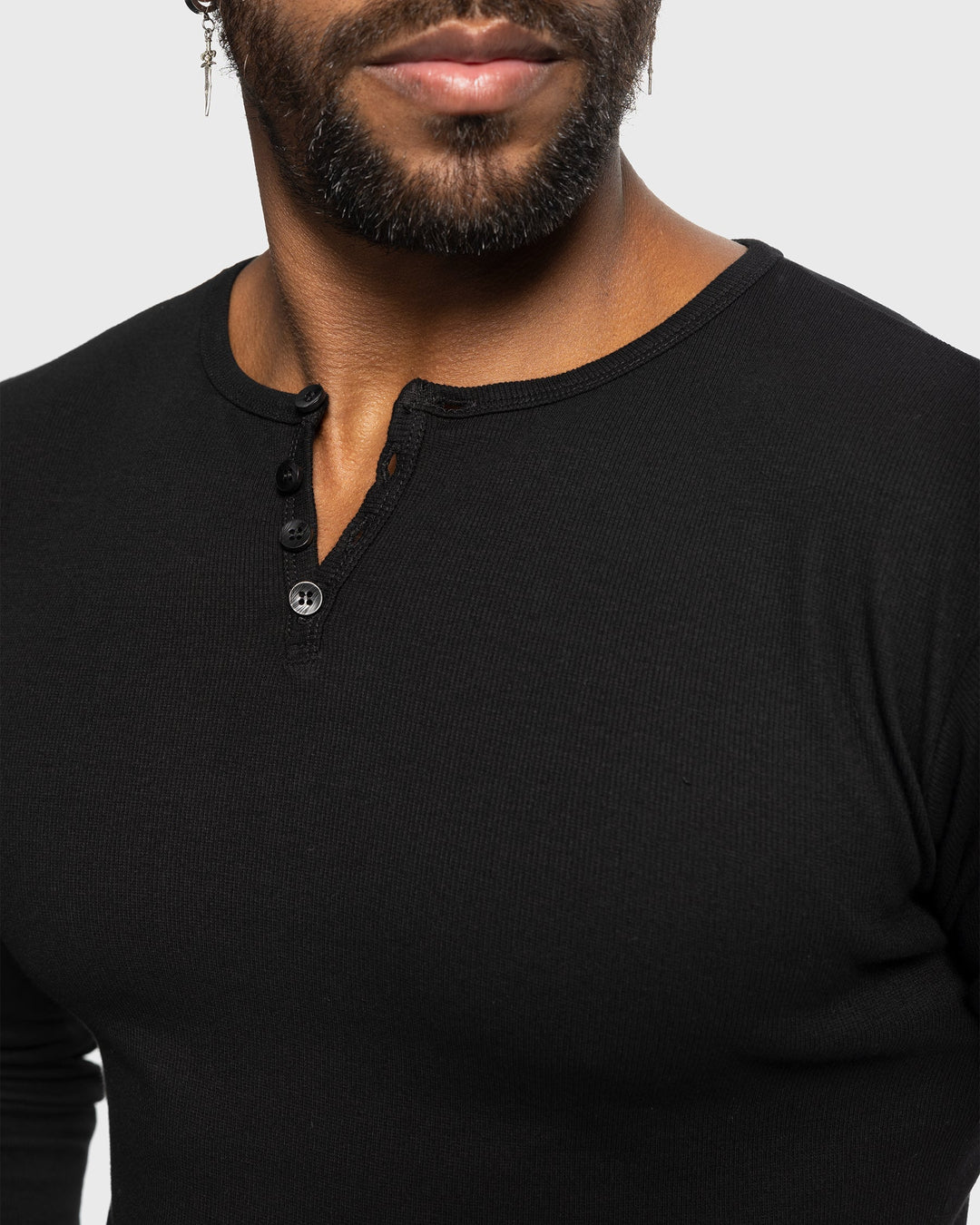Elegant Men's Siena Ribbed Henley, combining athletic style with comfort.