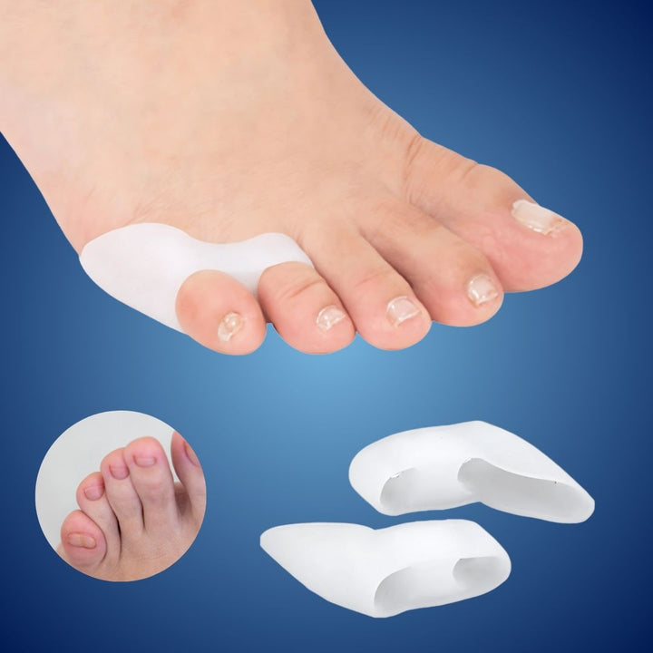 Close-up of soft silicone toe spacers for bunion and hammertoe relief, promoting toe alignment.