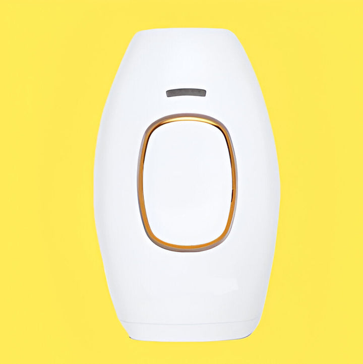 Ergonomic women's laser hair removal device for painless at-home permanent hair reduction.