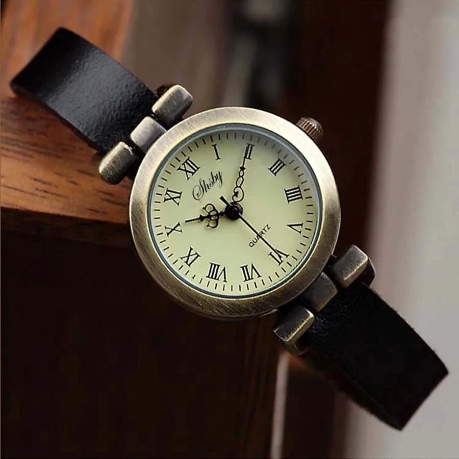 Classic women's watch with an interchangeable leather strap, featuring a reliable quartz mechanism.