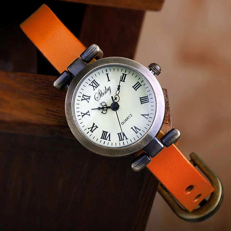 Women's elegant watch with a dark brown leather strap, perfect for a classic, antique look.
