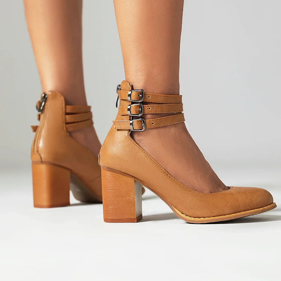 Sophisticated women's strappy heels with comfortable block heel design.
