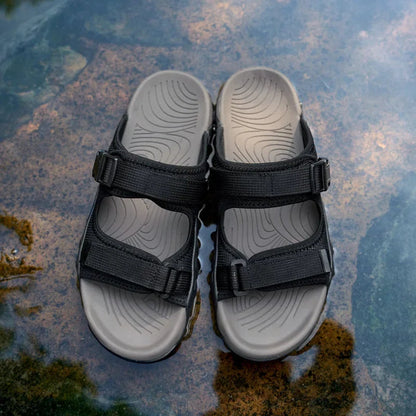 TerraGlide men's summer footwear, comfortable and durable adventure sandals with adjustable fit.
