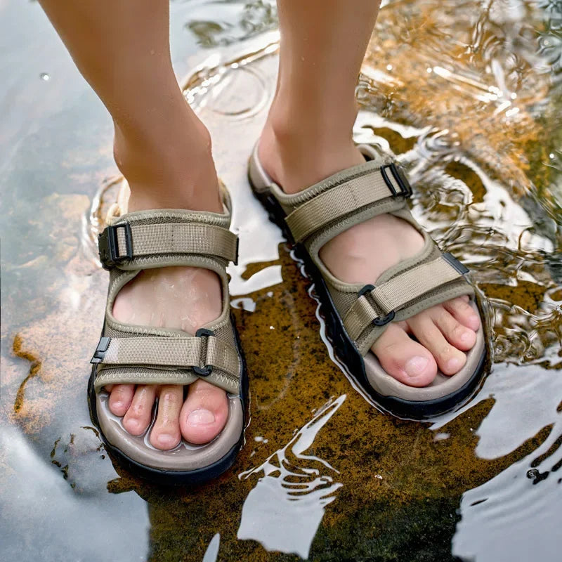 Front view of men's TerraGlide adventure sandals, featuring a durable multi-terrain sole.
