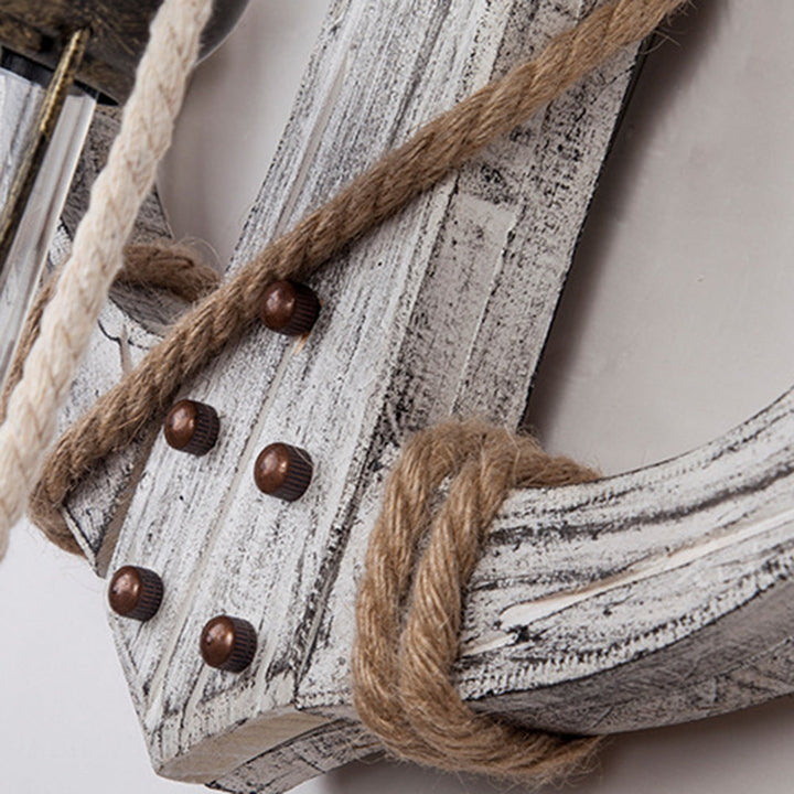 Create a maritime feel with this anchor wall sconce. Coastal LED lighting for home decor and ambiance.